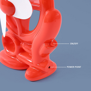 Close-up of the power button on a cart shape USB mini fan