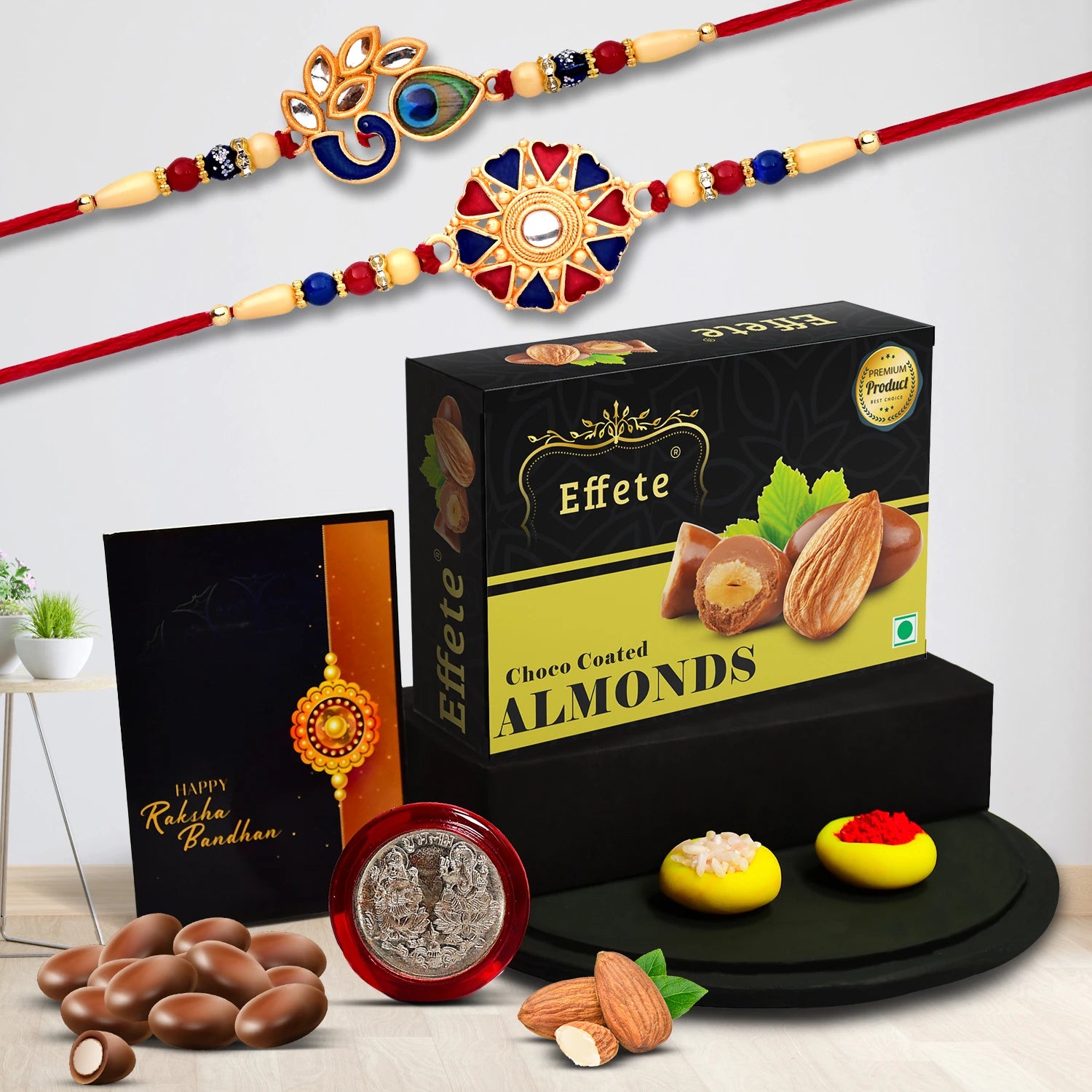 Rakhi Gift Combo for brother featuring two premium rakhis, choco almonds, silver coin, and roli chawal.