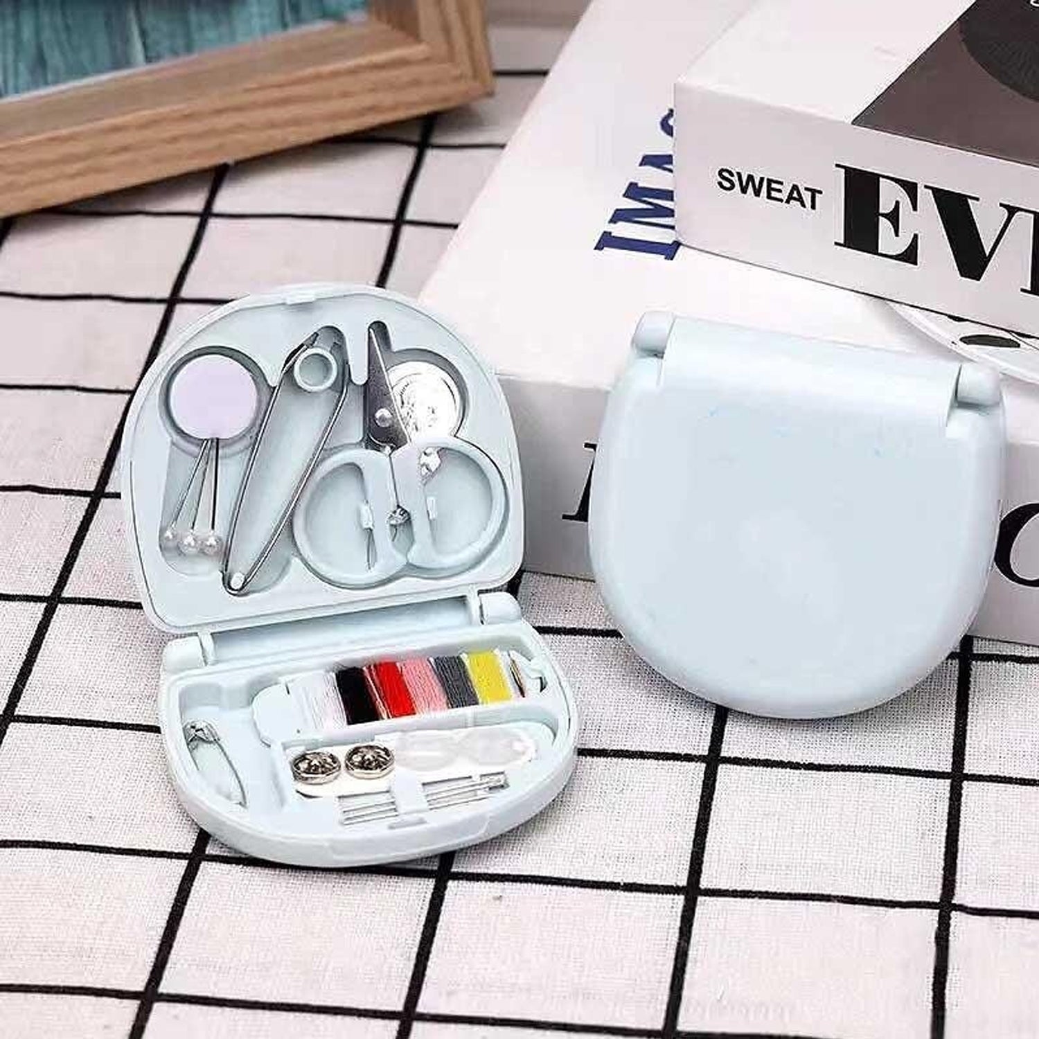 Contents of 1290 Mini Travel Sewing Kit with needles and threads