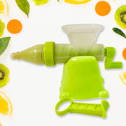 Assembled lime green and translucent manual juicer with a handle on a plain white background.