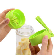 Close-up of the 6-blade stainless steel mechanism inside the portable juicer