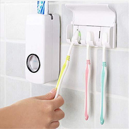 174 Automatic Toothpaste Dispenser and Brush Holder mounted on bathroom wall