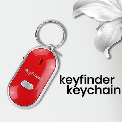 Portable whistle key finder on white background