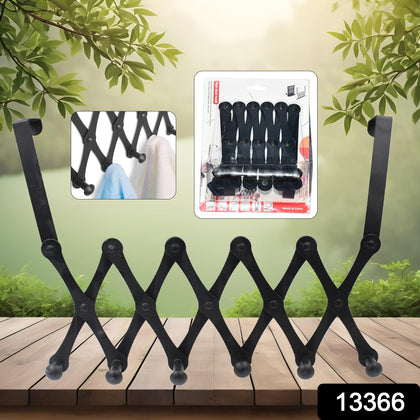 6 hook over-the-door hanger in black steel, shown hanging on a white door