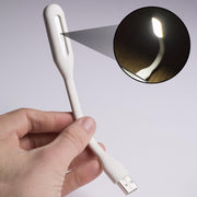 Mini USB fan, light & hub connected to a laptop