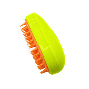 A lime green and orange pet brush with soft bristles is shown from a slight angle on a white background.