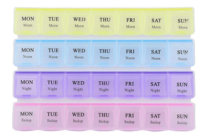 Full view of the 28-compartment weekly pill organizer with pastel colored lids