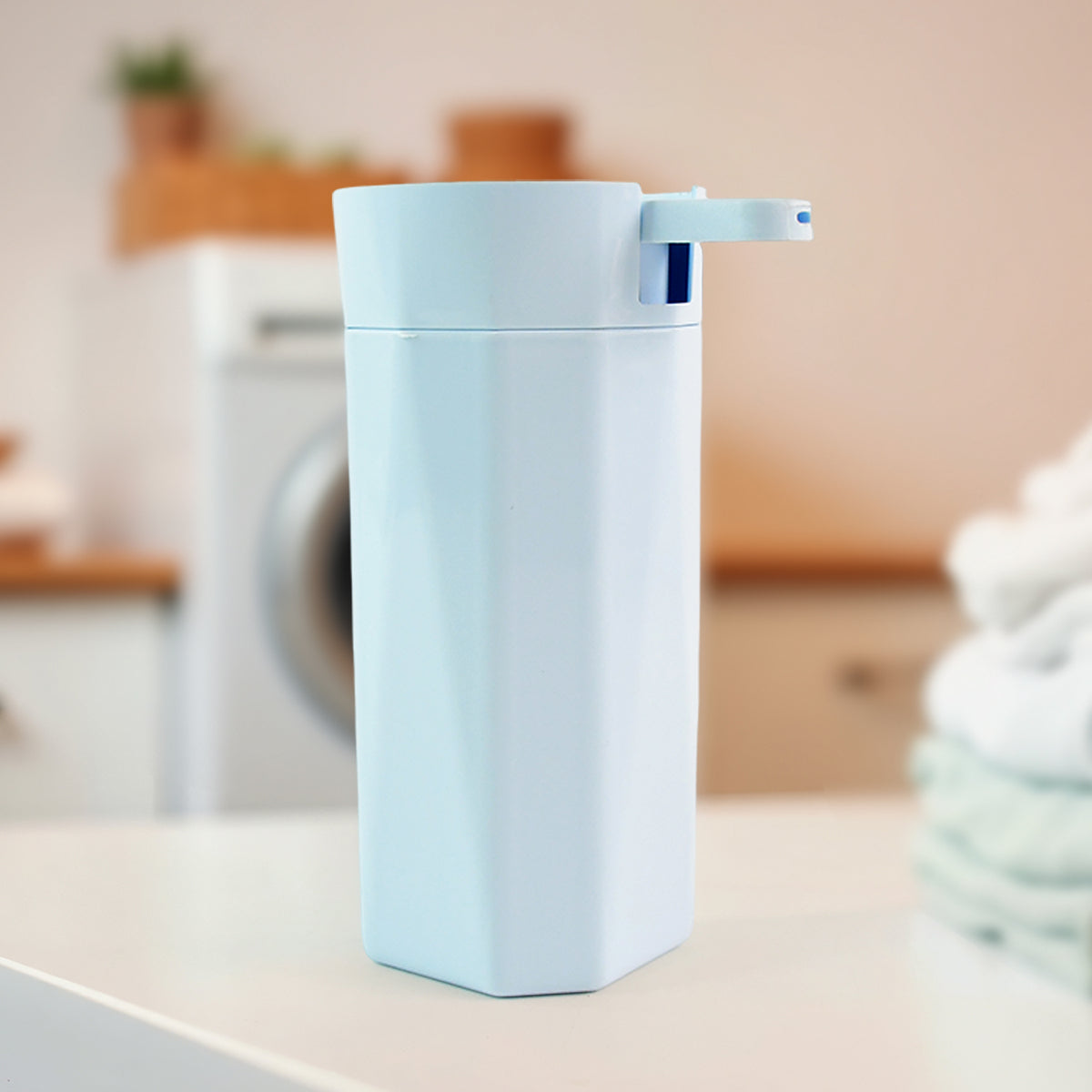 Apex Push It! soap dispenser on a modern bathroom counter
