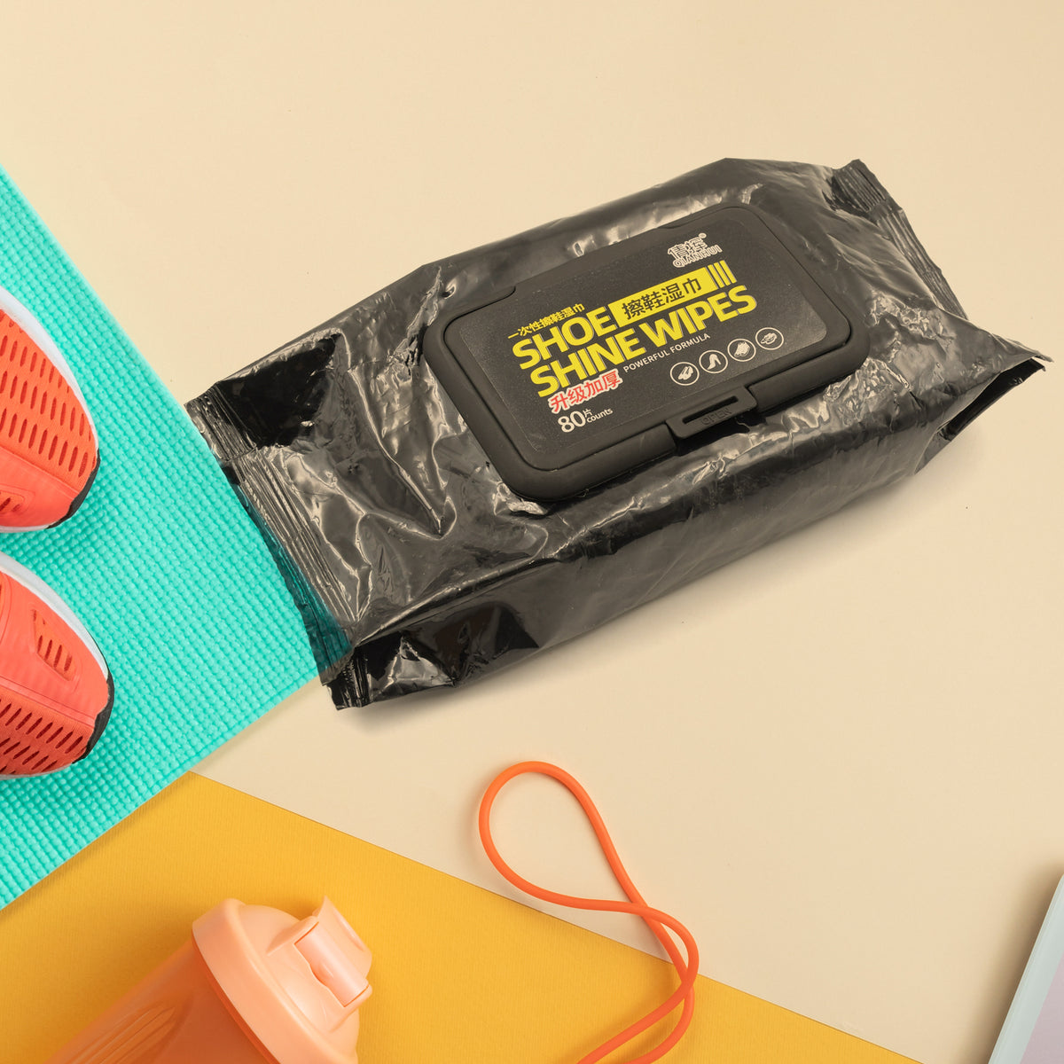 Close-up of wipe tissue removing dirt from sneaker