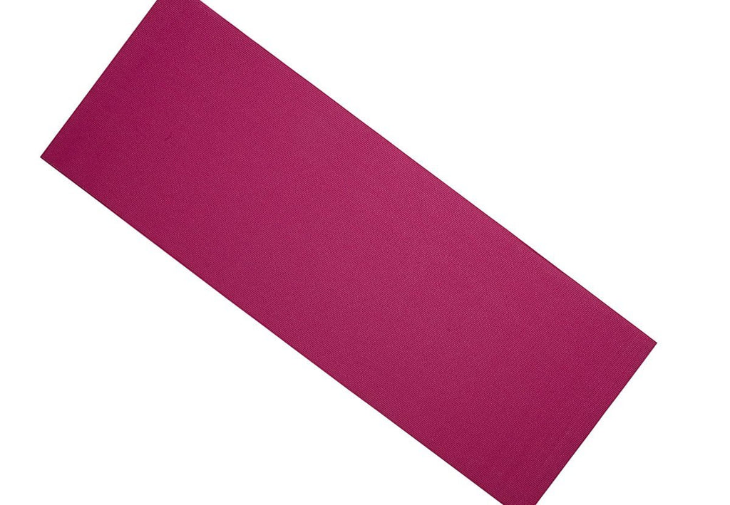 Rolled-up yoga mat, showcasing its compact and portable design.