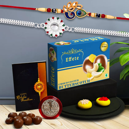 A vibrant Rakhi Gift Combo for brother featuring two designer rakhis, chocolate, and tilak set.
