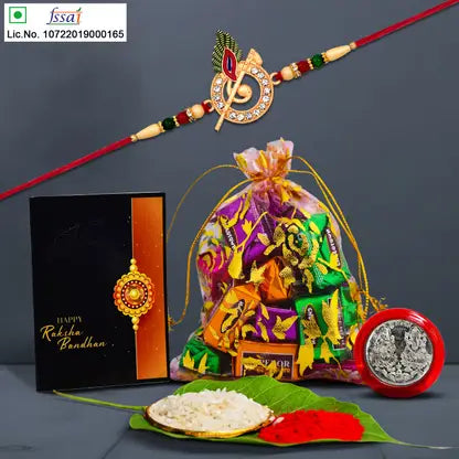 Rakhi Gift Combo with designer Rakhi, chocolates, silver coin, roli chawal & greeting card
