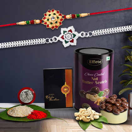 Wukusy Rakhi Combo Set featuring a designer rakhi, choco-coated cashews, roli-chawal, and a blessing coin.