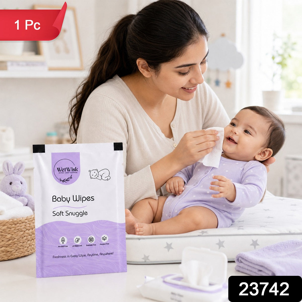 A woman gently cleans a smiling baby's face with a white wipe, next to a purple and white wet wipes package.