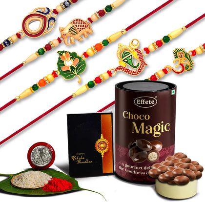A beautifully arranged Designer Rakhi Set with Choco Magic gift pack and Pooja Thali combo.