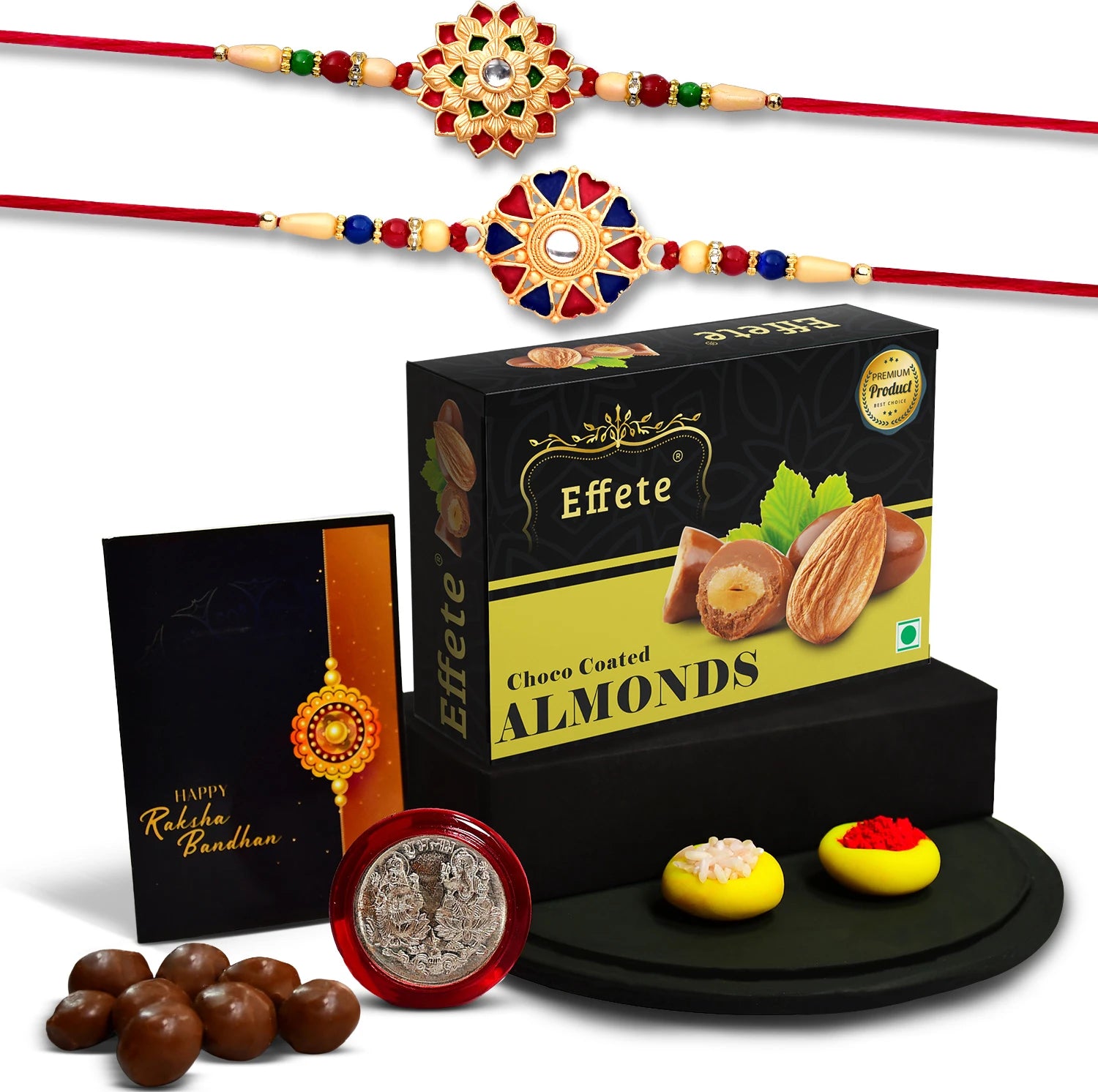 Premium Rakhi gift set for brother featuring two rakhis, choco almonds, and a silver coin.
