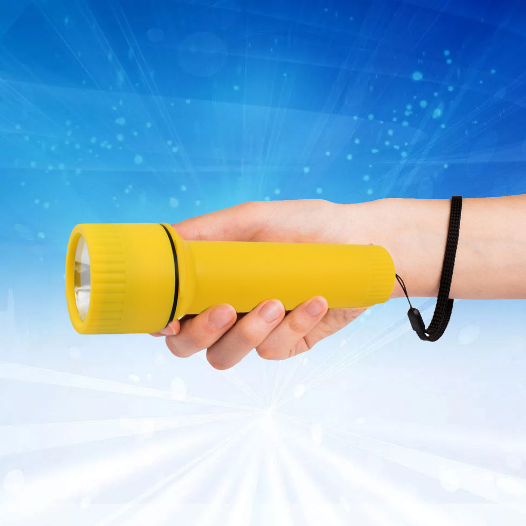 Powerful beam from LED flashlight illuminating a dark room
