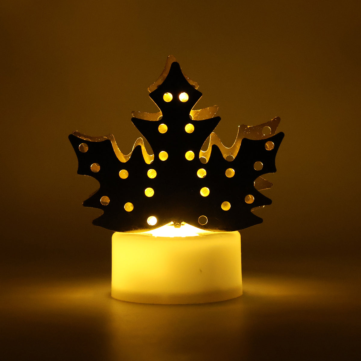 LED diya lamp lit with warm flickering glow in a festive setting