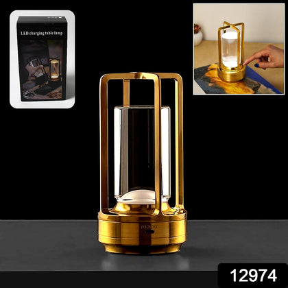 Crystal lantern table lamp with a warm yellow glow on a wooden surface