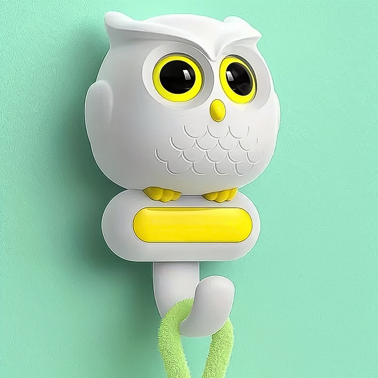 Bird-shaped self-adhesive wall hook displayed on a textured wall, ready to hold small items.