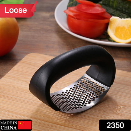 Stainless steel garlic press from top view