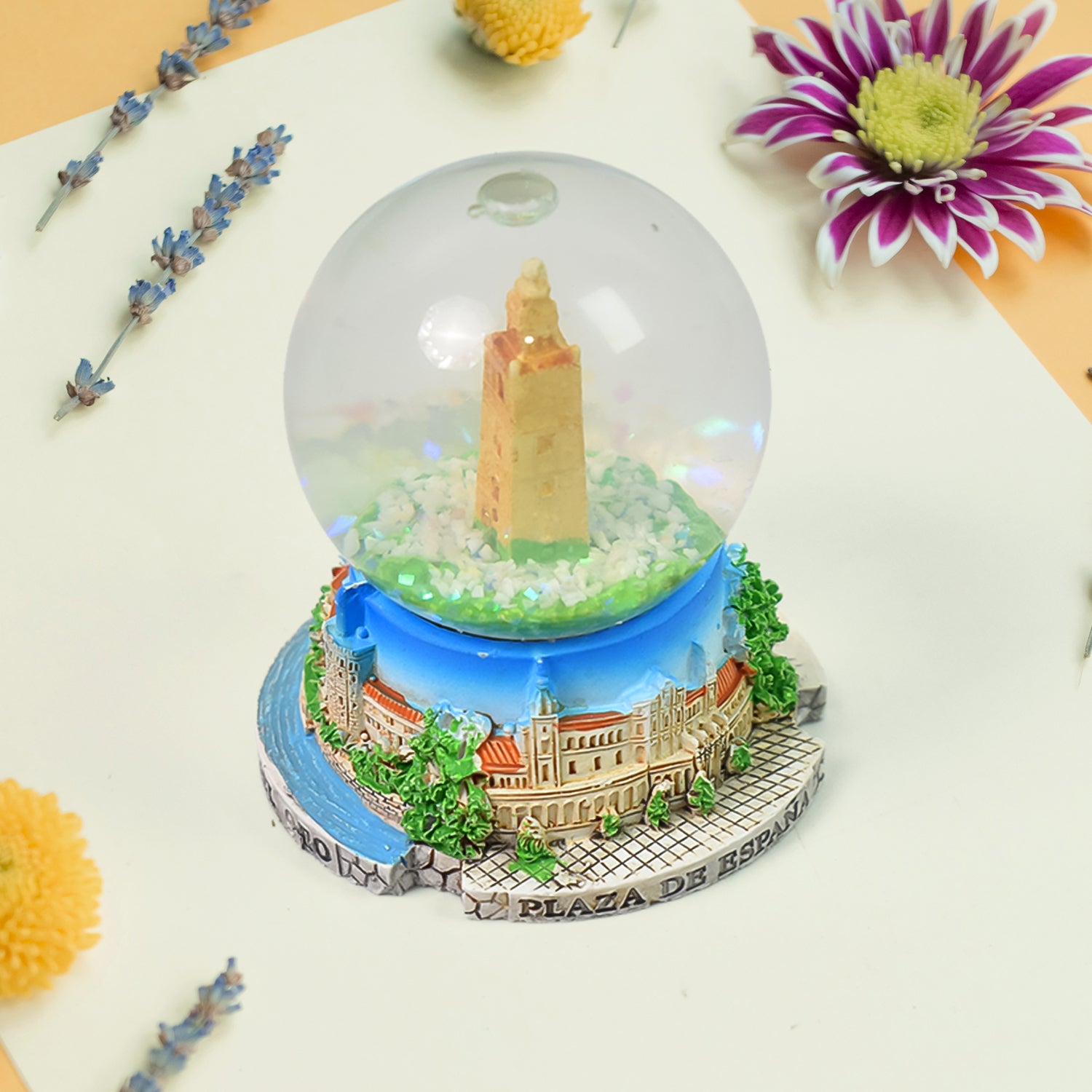 Close-up of snow globe souvenir with travel design
