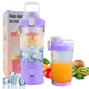Portable electric juicer blending a smoothie with 8 stainless steel blades