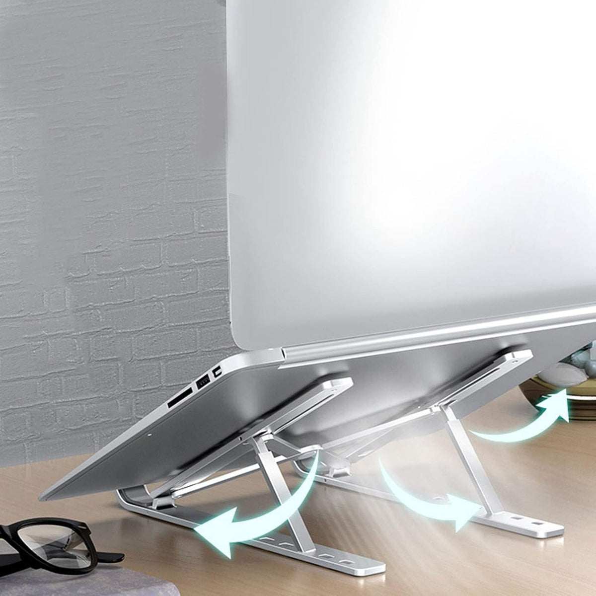 Side view of the adjustable metal laptop stand, demonstrating a raised angle