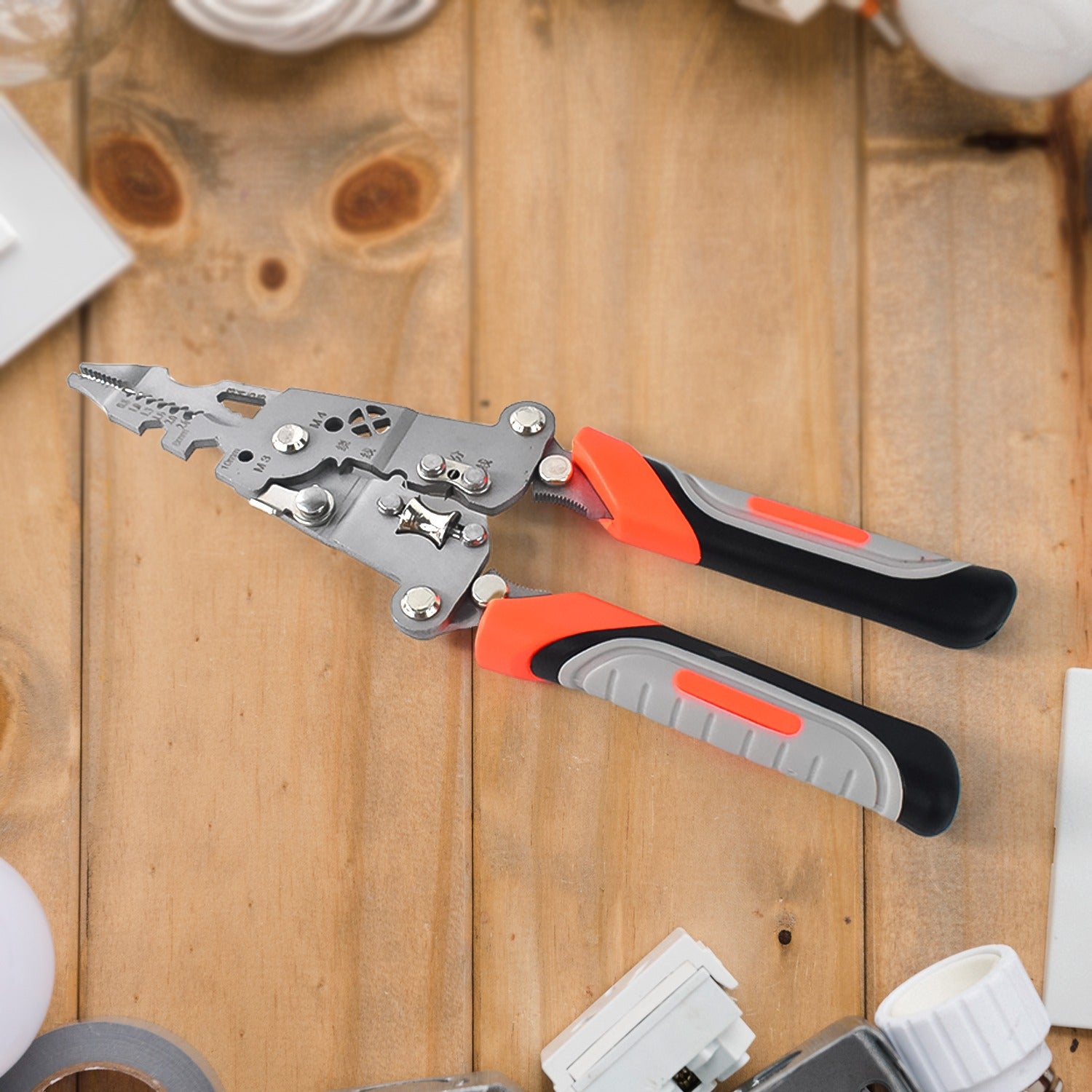 8-in-1 wire stripper pliers with soft grip cutting wire