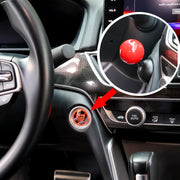 Close-up of metal alloy car push start button cover texture