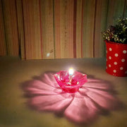 Colourful reflection diya set arranged beautifully, ready for a festive celebration.