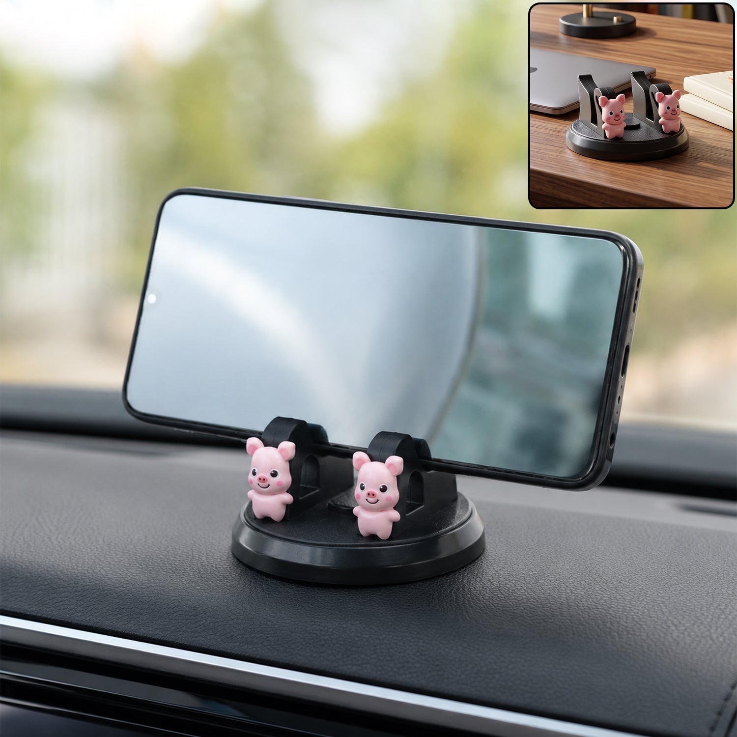 A black phone holder with two pink pig figurines on a car dashboard, holding a smartphone horizontally