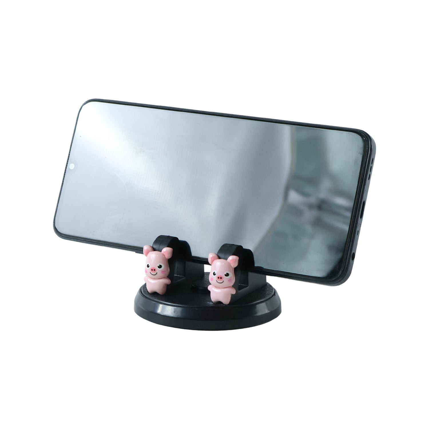 A black phone holder with two pink pig figurines holding a smartphone horizontally on a white background.