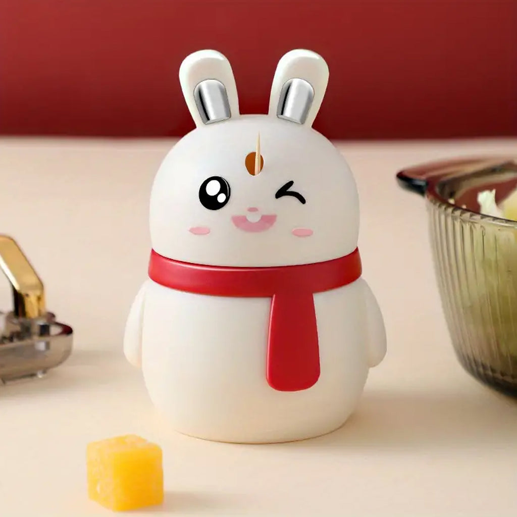 Close-up of the red rabbit toothpick dispenser, highlighting its cute facial features.