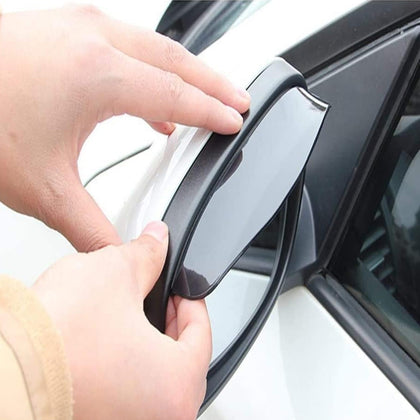 Car mirror rain guards installed on rearview mirrors