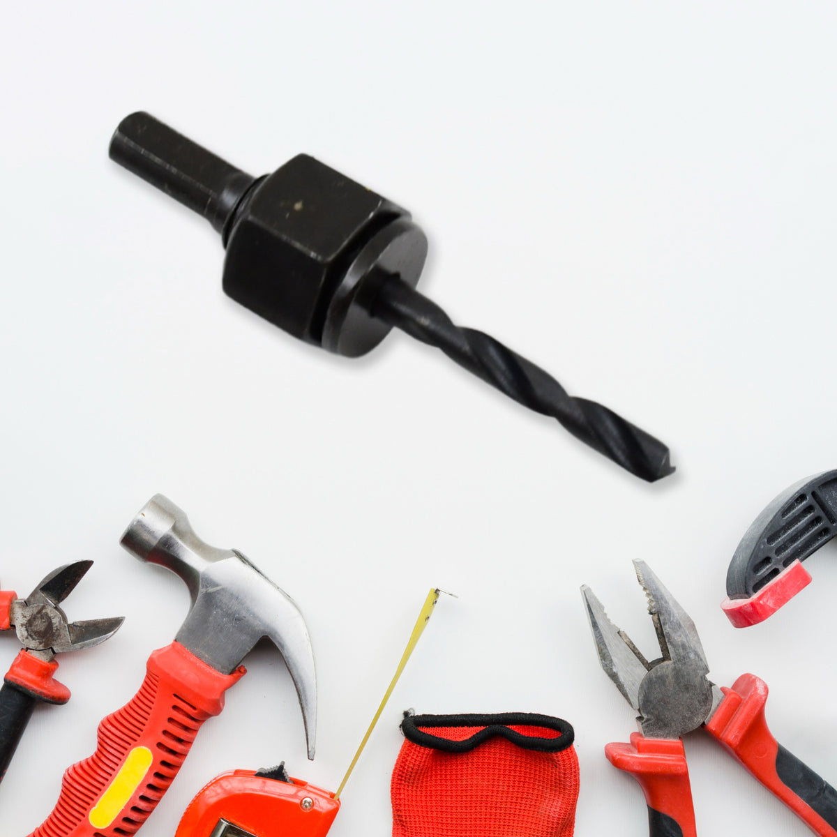 Hole saw kit attached to a power drill, ready for use