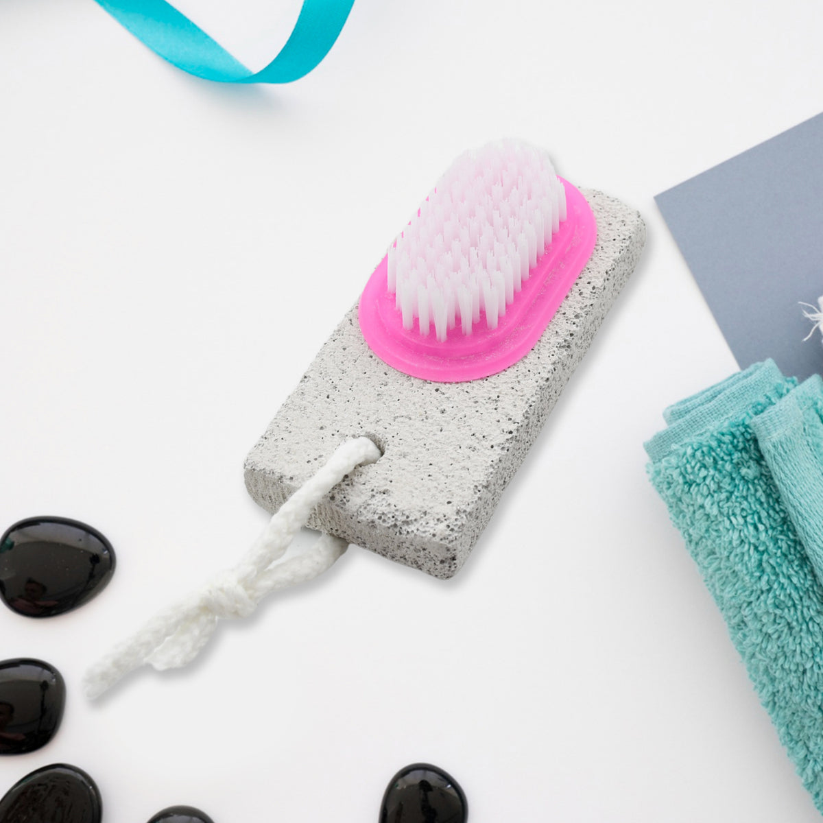 Close-up of pumice stone and brush heads on 9352 foot scrubber