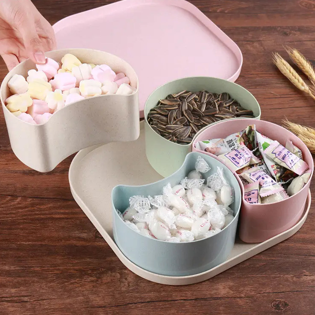 Side view of the rotating divided snack box