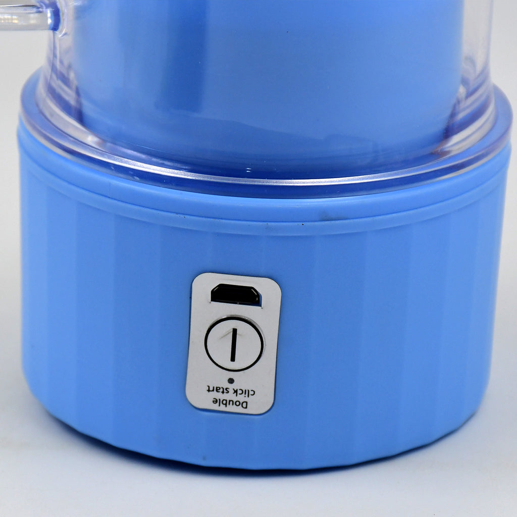 Fresh fruits being blended into a healthy smoothie by the mini juicer mixer.