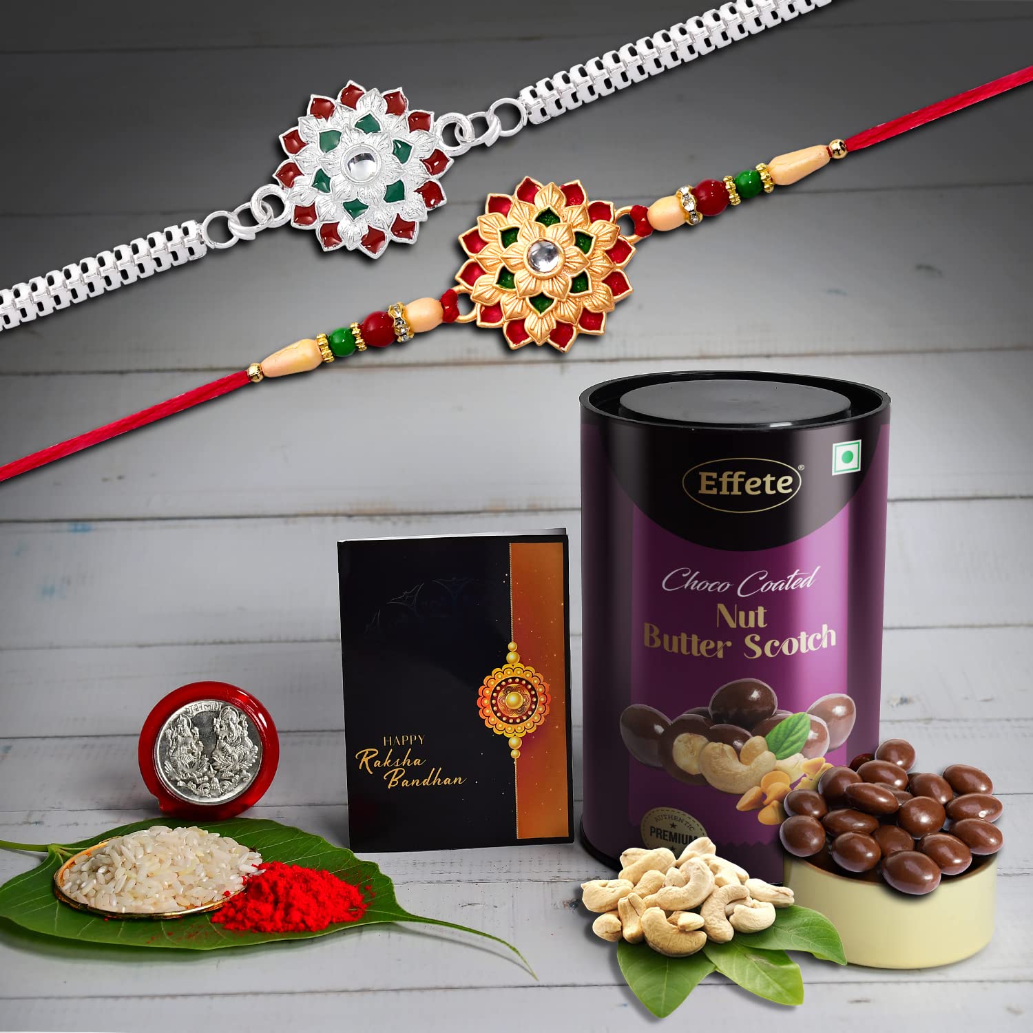 Rakhi Gift Pack with fancy Rakhi, butterscotch nuts, and pooja essentials.