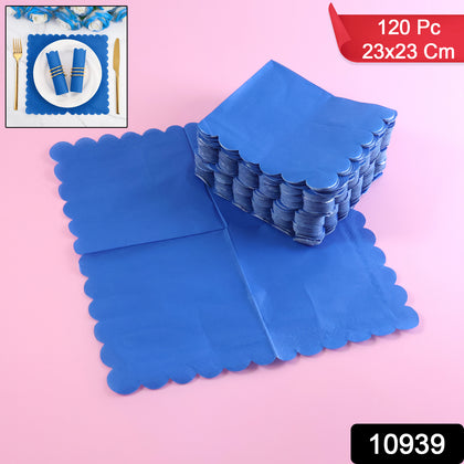 Close-up of royal blue scalloped paper napkin with elegant edge