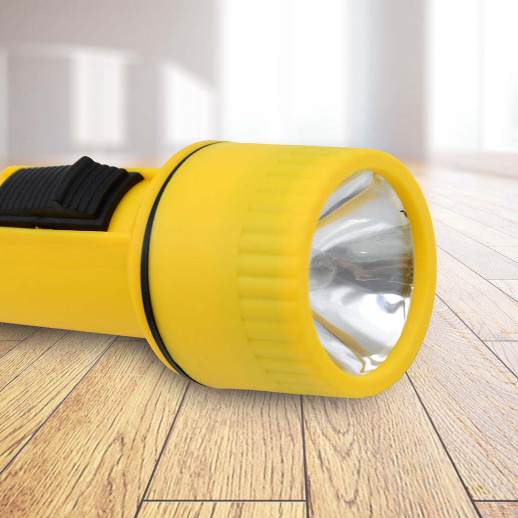 Close-up of LED flashlight torch on a surface
