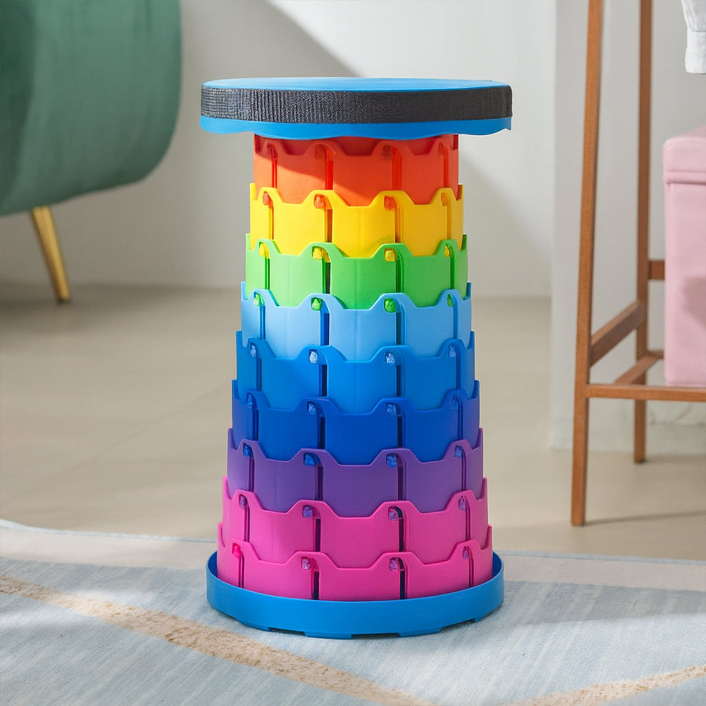 Close-up of the durable ABS plastic material and vibrant rainbow pattern of the folding stool.