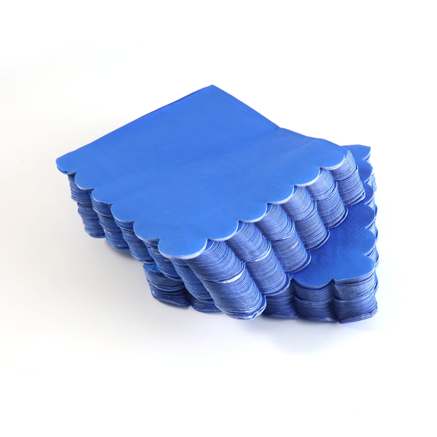 Royal blue scalloped napkin unfolded, showing 23x23cm size