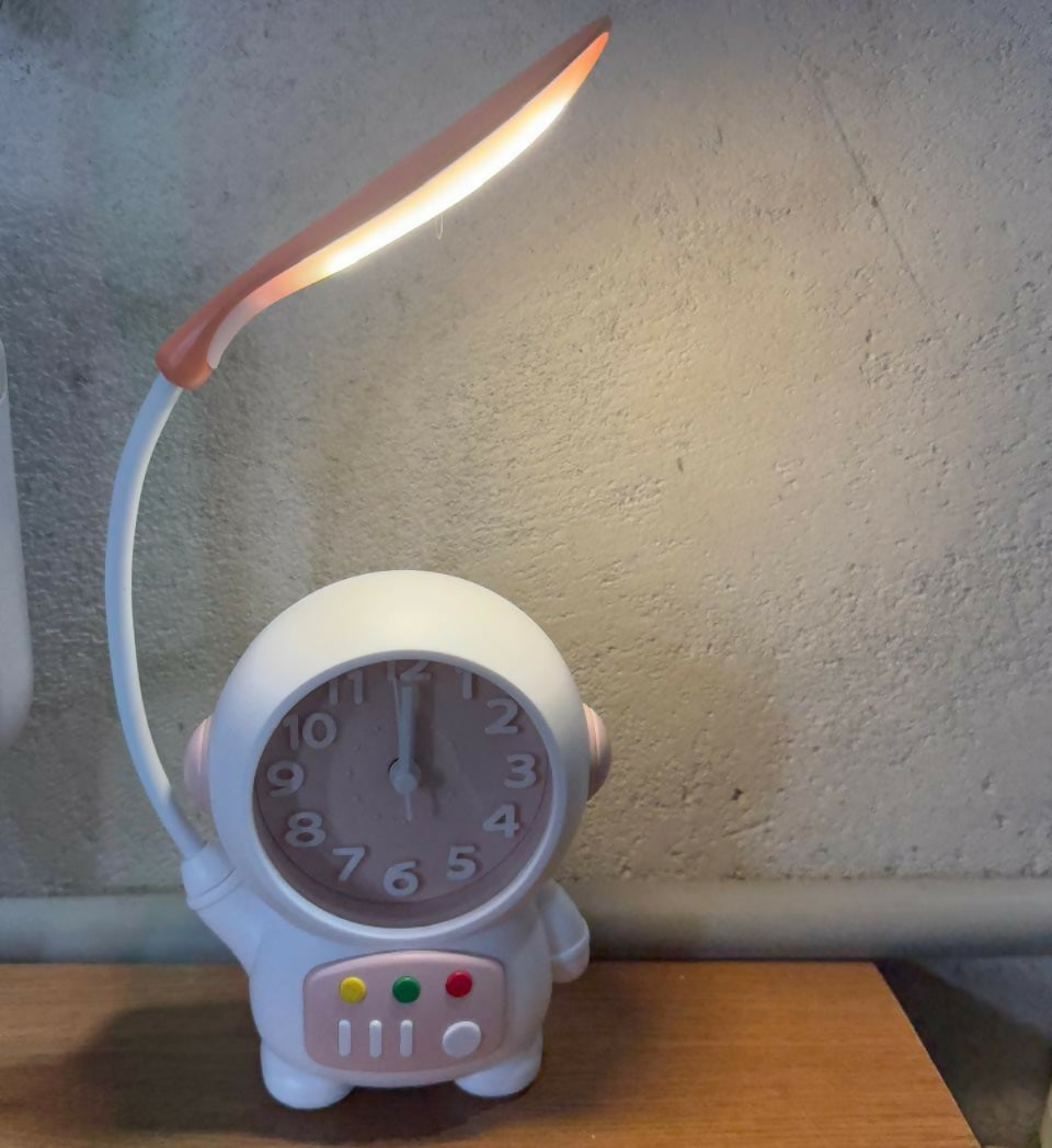 Astronaut Table Lamp on a bedside table