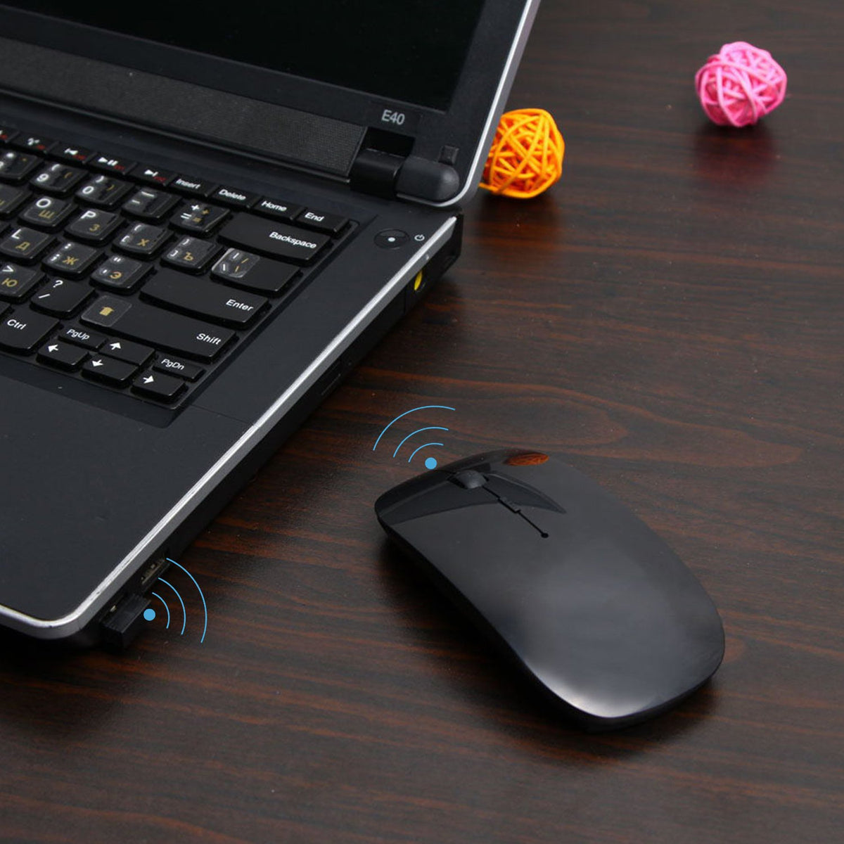 Wireless mouse side angle showing slim design