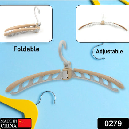 Portable folding clothes hanger in use, showing 360-degree rotation