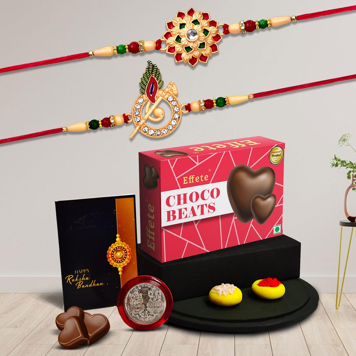 Complete Rakhi Gift Pack with designer rakhis, chocolates, and Tilak set.