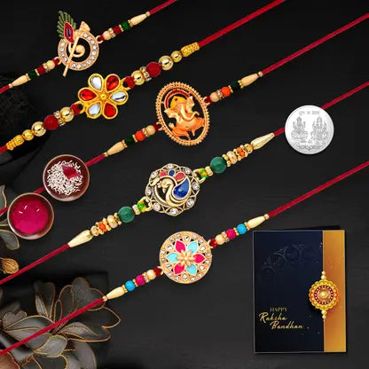 Set of 8 designer rakhis, including traditional & modern designs, with greeting card, roli chawal, chocolate, and shagun coin