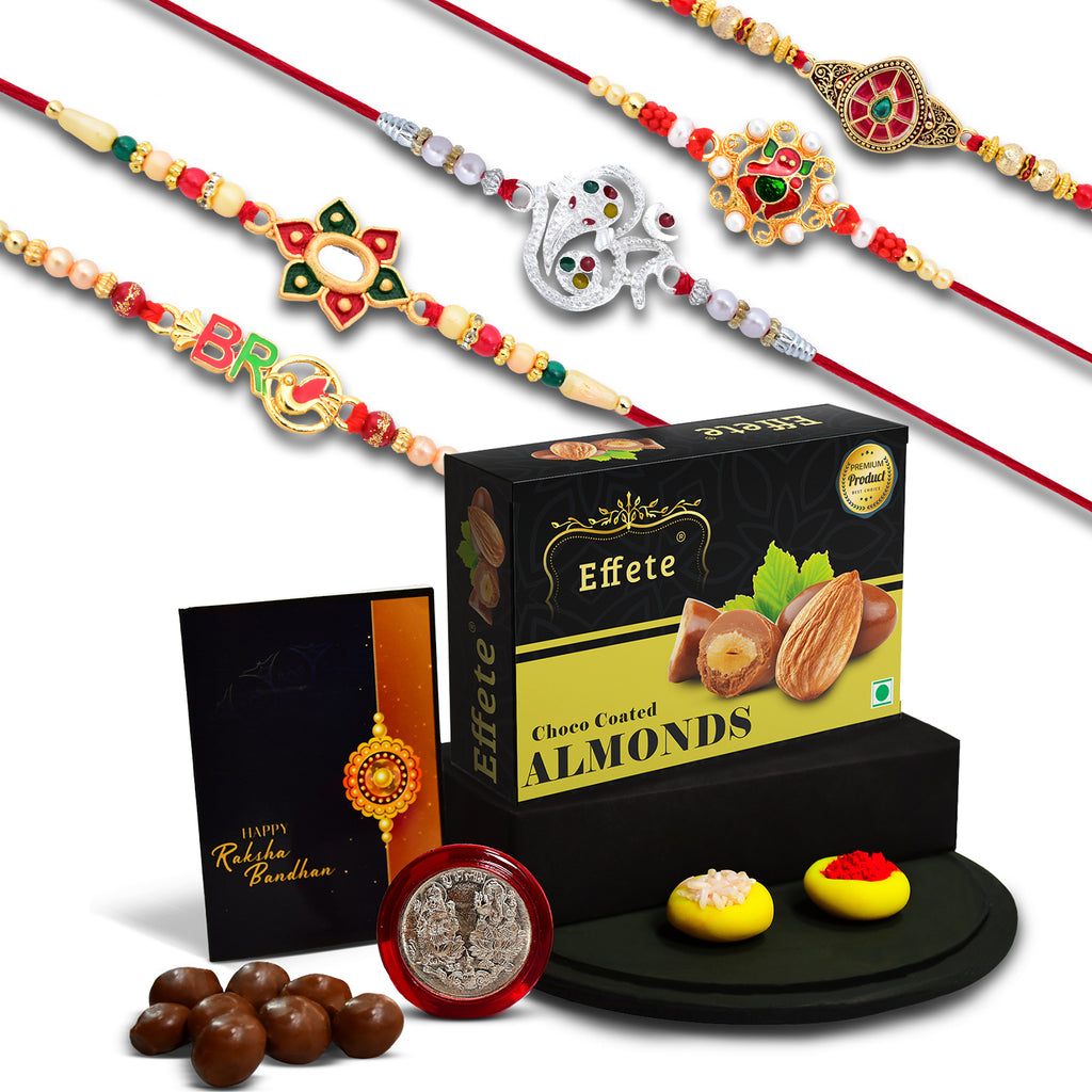 Complete Rakhi Gift Set from Wukusy featuring a fancy Rakhi, chocolates, and pooja coin.